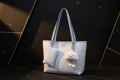 Blue star tote on black and gold background